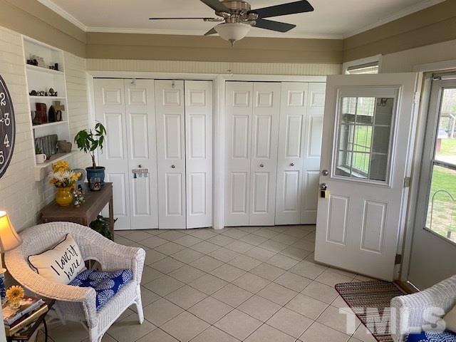 8609 Cassam Road Bahama, NC 27503 - Photo 22 of 23 a view of a livingroom with furniture and a window