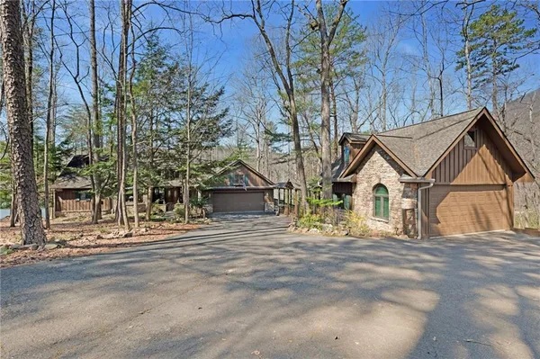 front view of a house with a trees