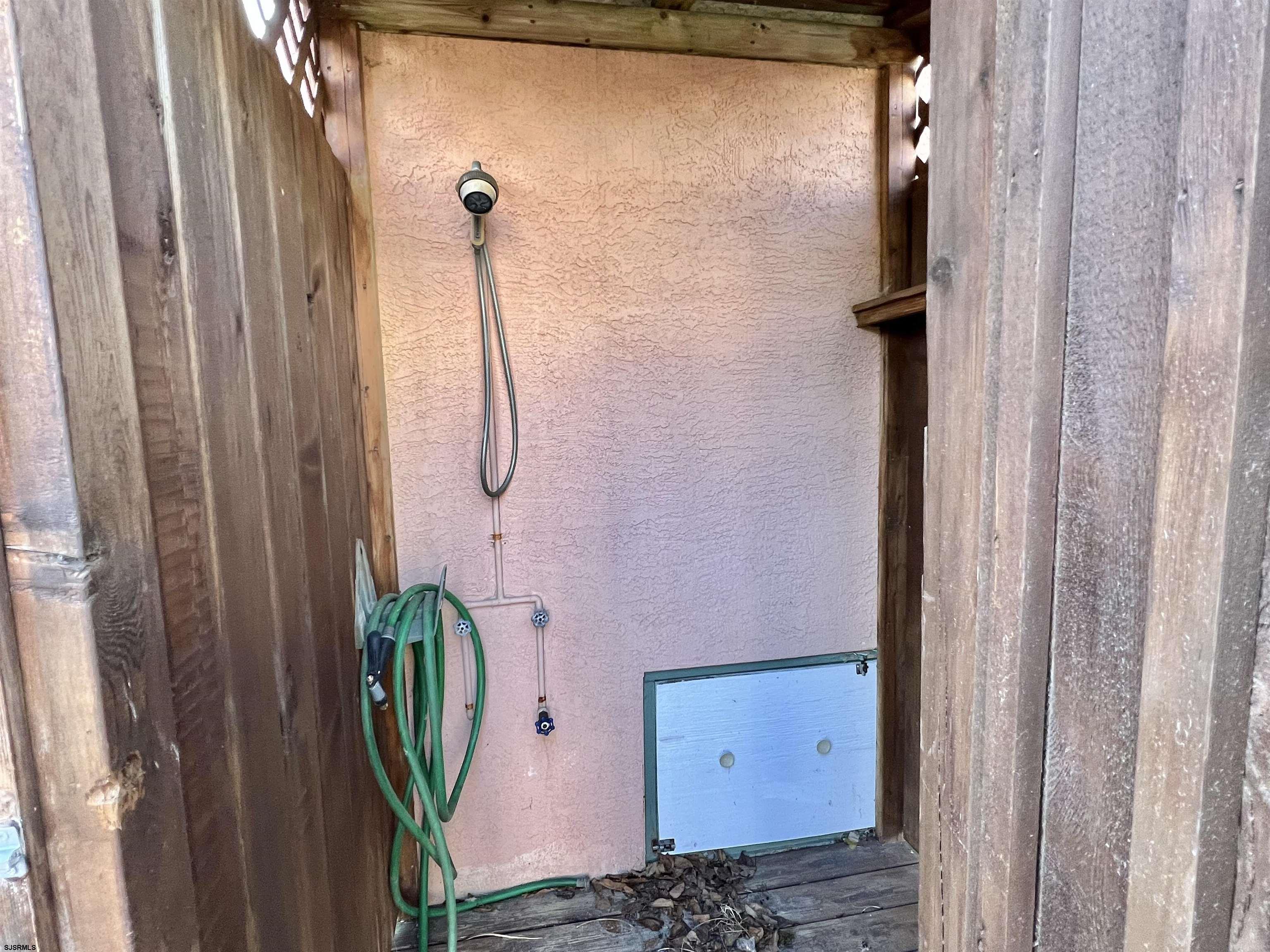 211 3rd Street North, Unit B Brigantine, NJ 08203 - Photo 42 of 52 a bathroom with a shower