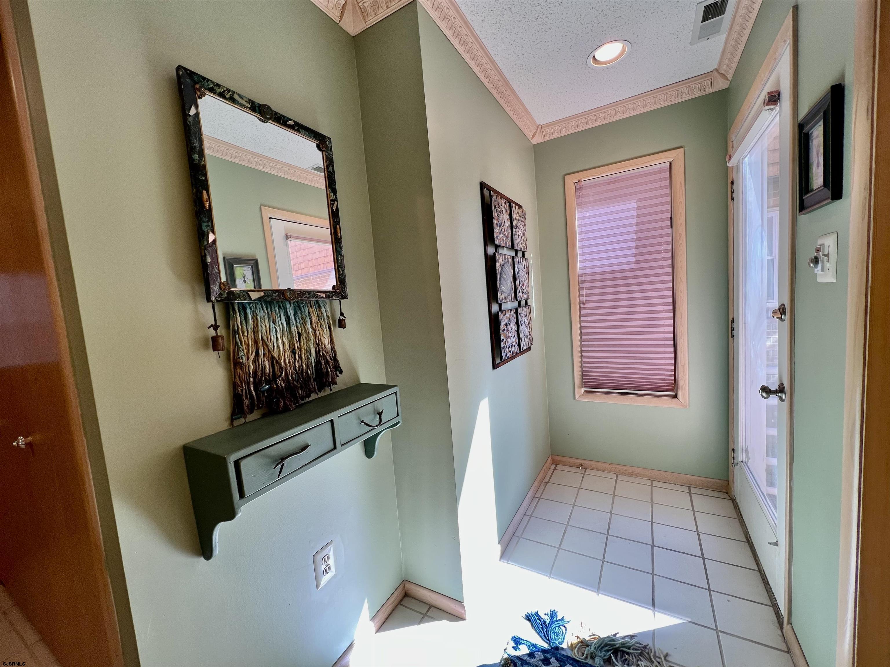 211 3rd Street North, Unit B Brigantine, NJ 08203 - Photo 8 of 52 a view of kitchen and utility room