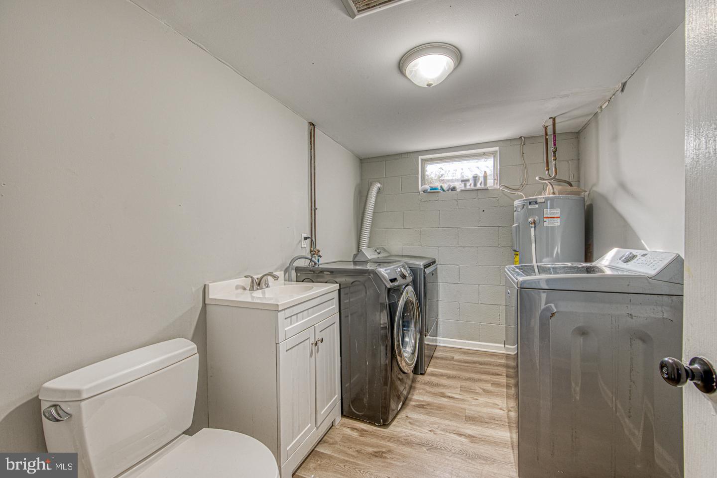 1514 Reed Street Coatesville, PA 19320 - Photo 21 of 23 Powder Room with Laundry