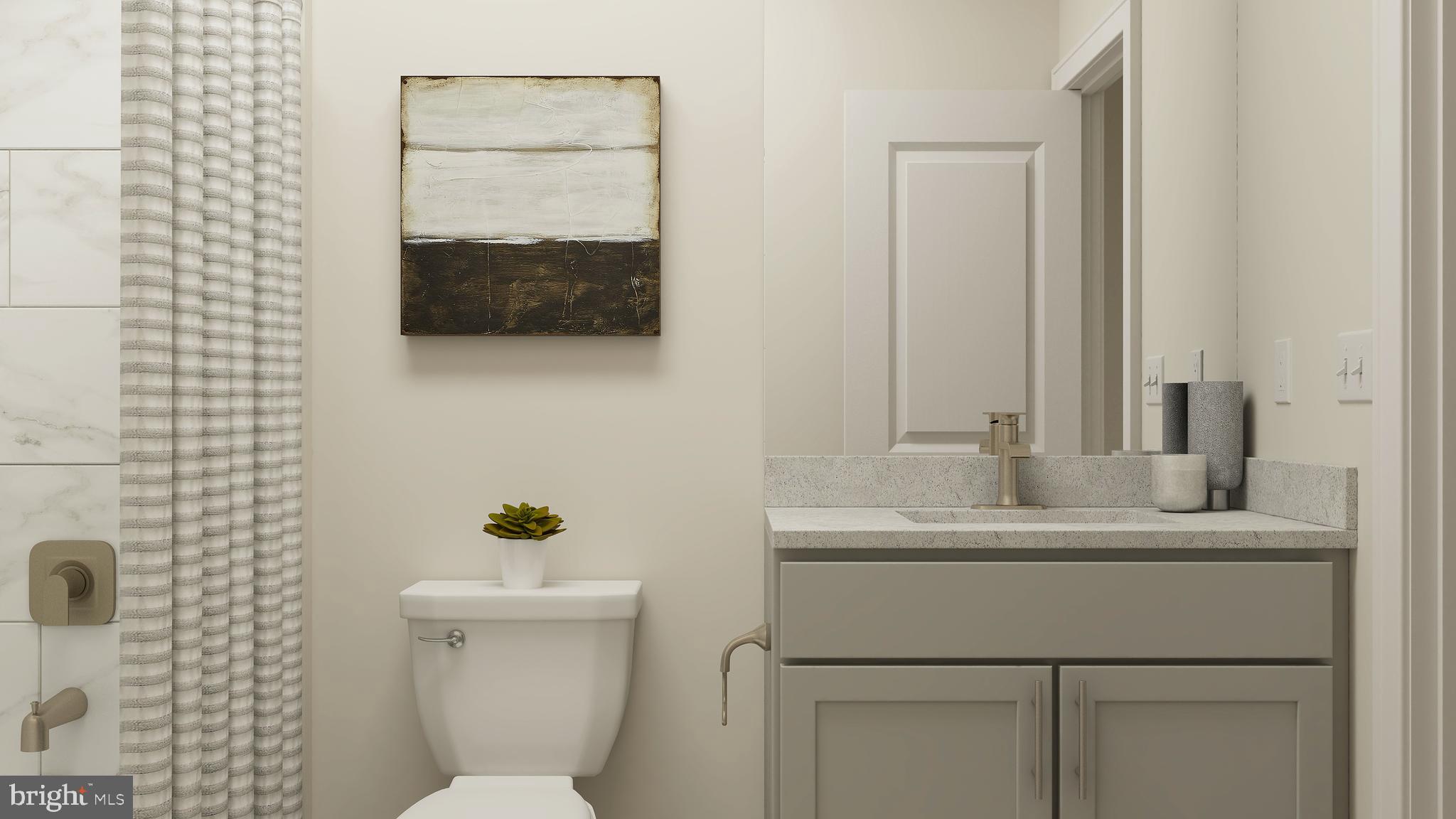 14027 Rolling Pasture Road Boyds, MD 20841 - Photo 12 of 39 a bathroom with a toilet sink and mirror