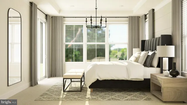 a living room with furniture and a large mirror