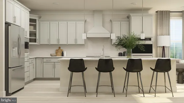 a kitchen with a sink stainless steel appliances cabinets and a counter top space