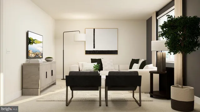 a bedroom with a bed a rug and a window