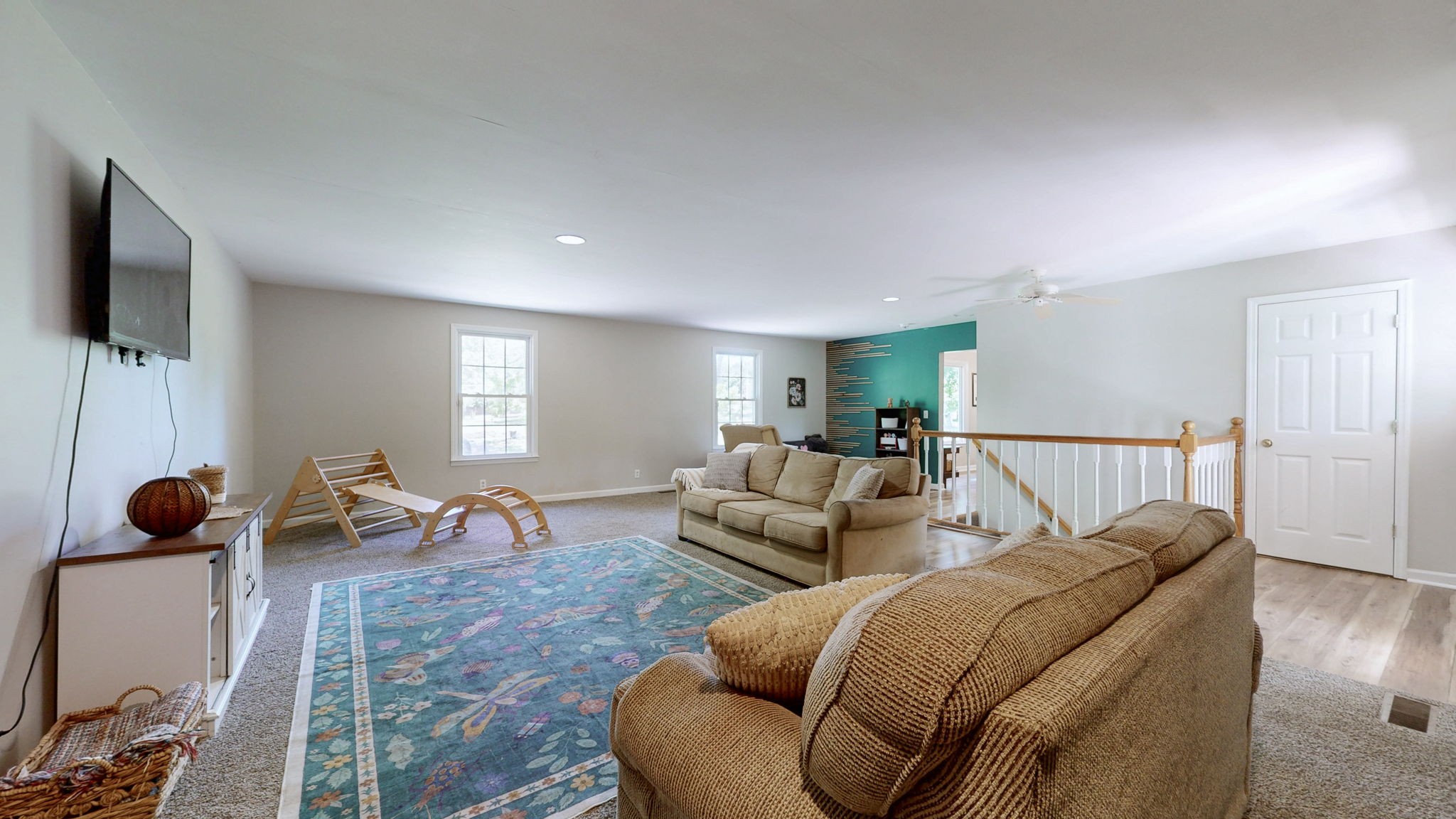 268 Raymond Hodges Road Cottontown, TN 37048 - Photo 19 of 38 a living room with furniture and a flat screen tv