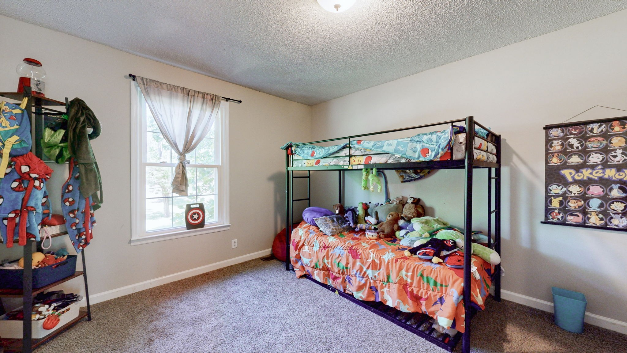268 Raymond Hodges Road Cottontown, TN 37048 - Photo 22 of 38 a bedroom with bed and wooden floor