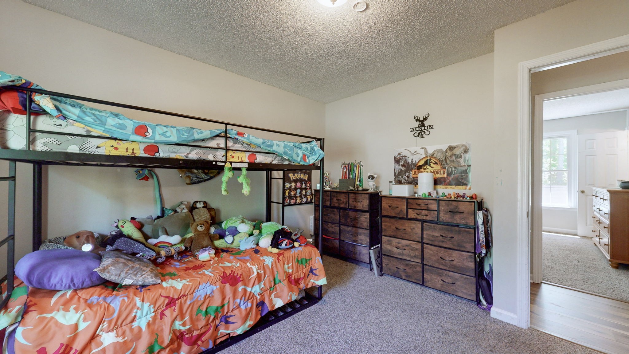 268 Raymond Hodges Road Cottontown, TN 37048 - Photo 23 of 38 a bedroom with a bed and small furniture