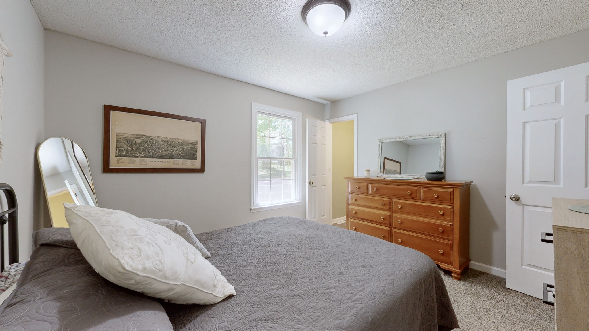 268 Raymond Hodges Road Cottontown, TN 37048 - Photo 25 of 38 a bedroom with a bed and furniture