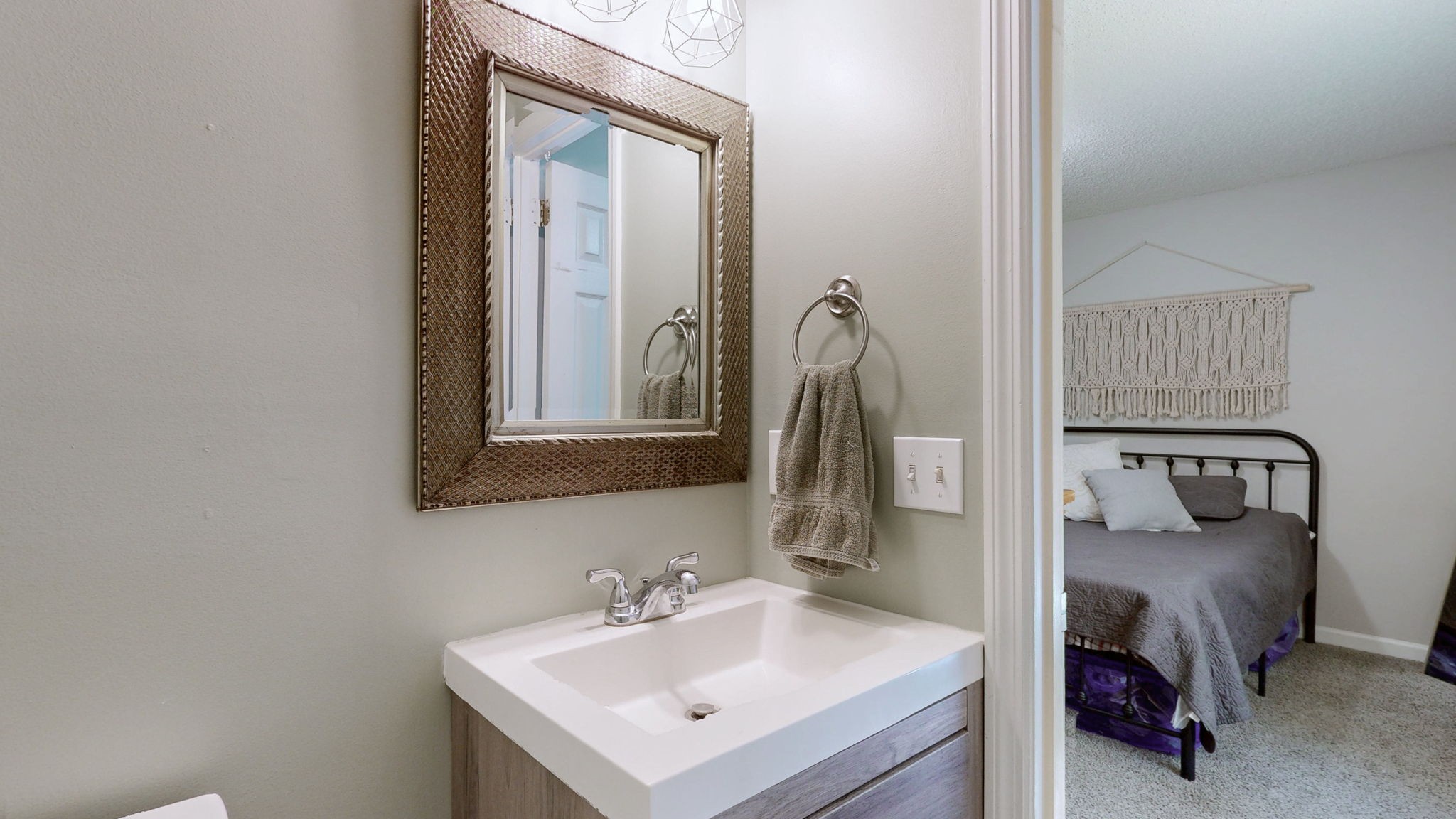 268 Raymond Hodges Road Cottontown, TN 37048 - Photo 26 of 38 a bathroom with a sink and a mirror