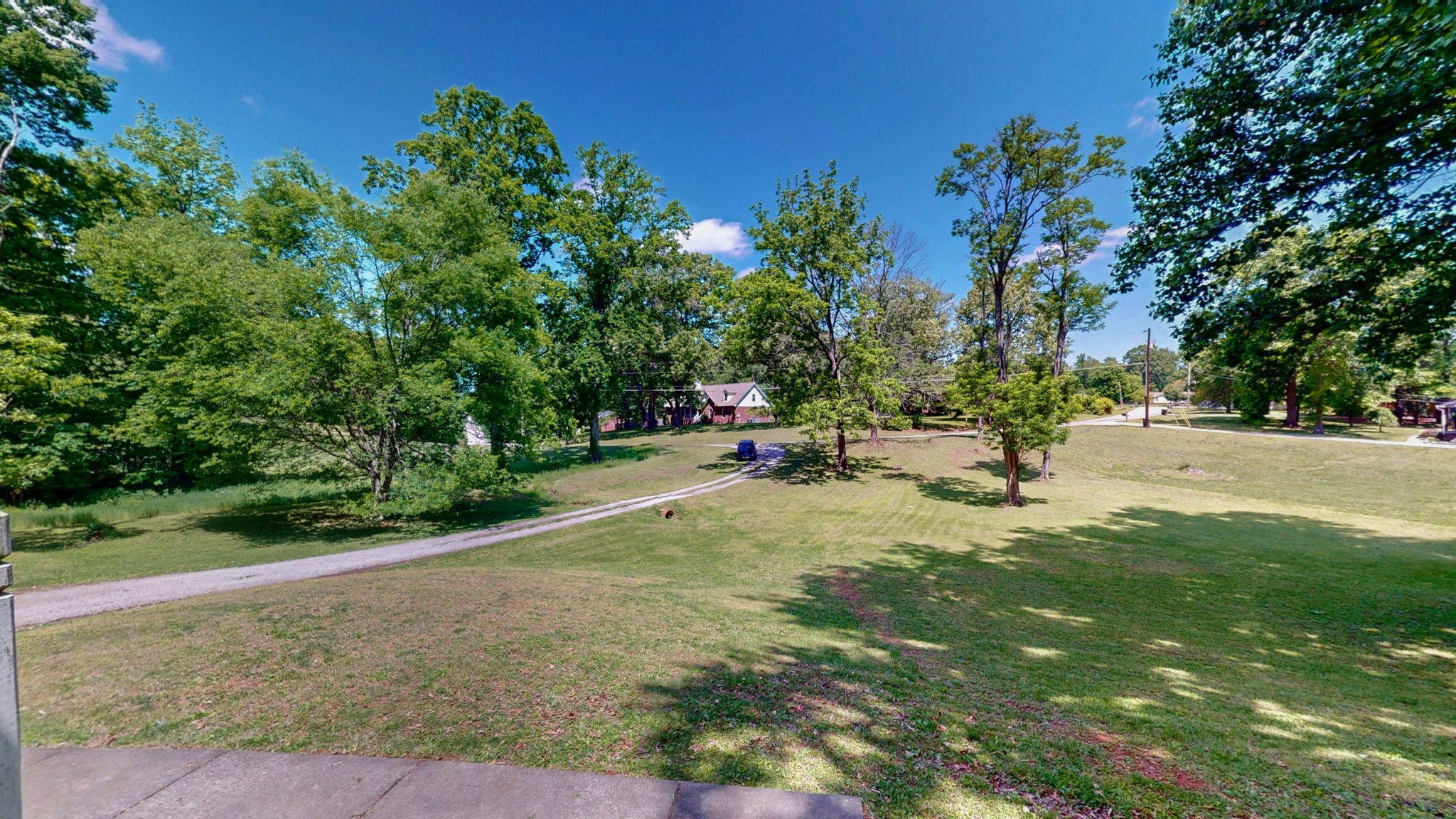268 Raymond Hodges Road Cottontown, TN 37048 - Photo 30 of 38 a view of a park with swings