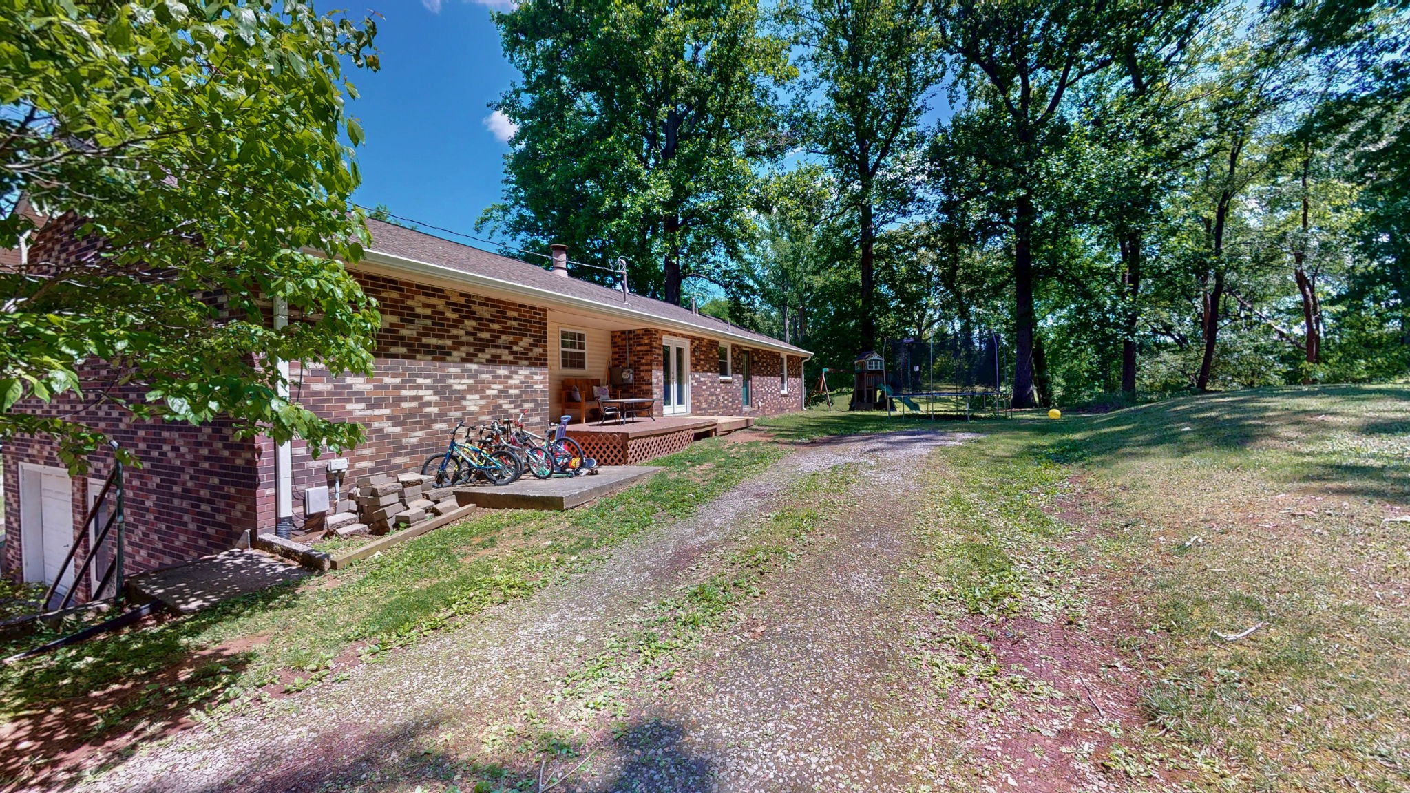 268 Raymond Hodges Road Cottontown, TN 37048 - Photo 31 of 38 a front view of a house with garden
