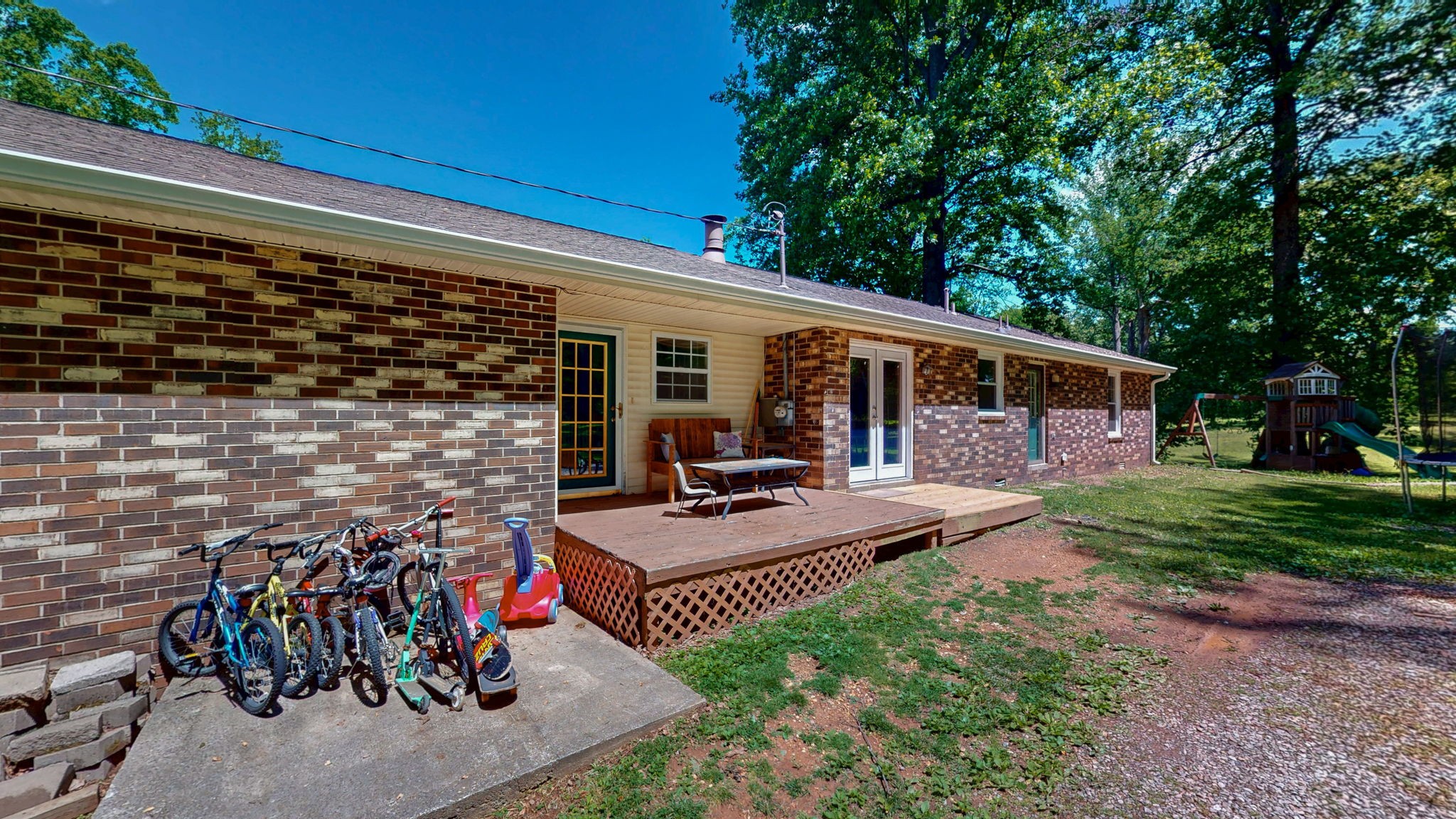 268 Raymond Hodges Road Cottontown, TN 37048 - Photo 32 of 38 a view of a house with backyard and sitting area