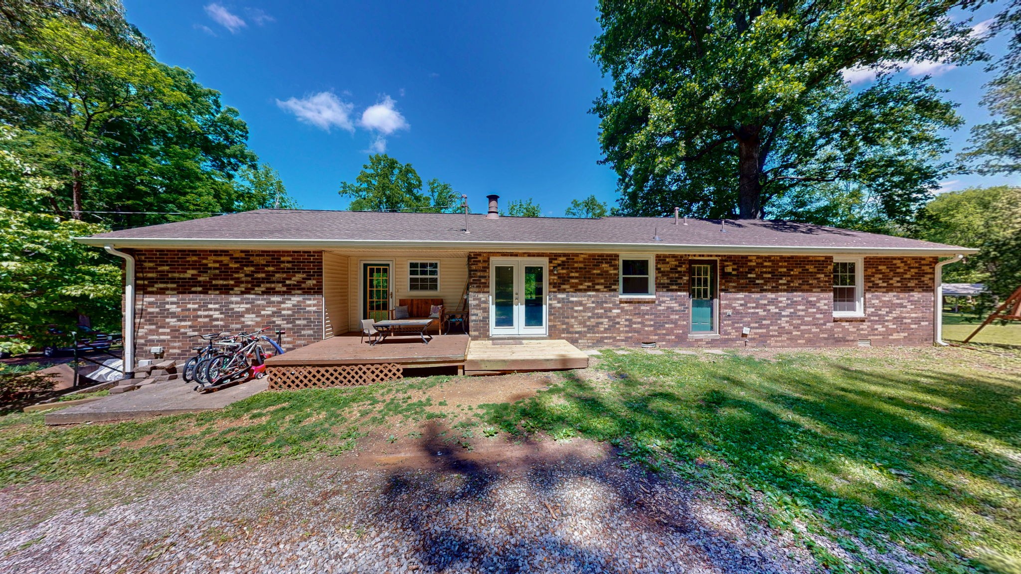 268 Raymond Hodges Road Cottontown, TN 37048 - Photo 33 of 38 a view of a house with a yard balcony and sitting area
