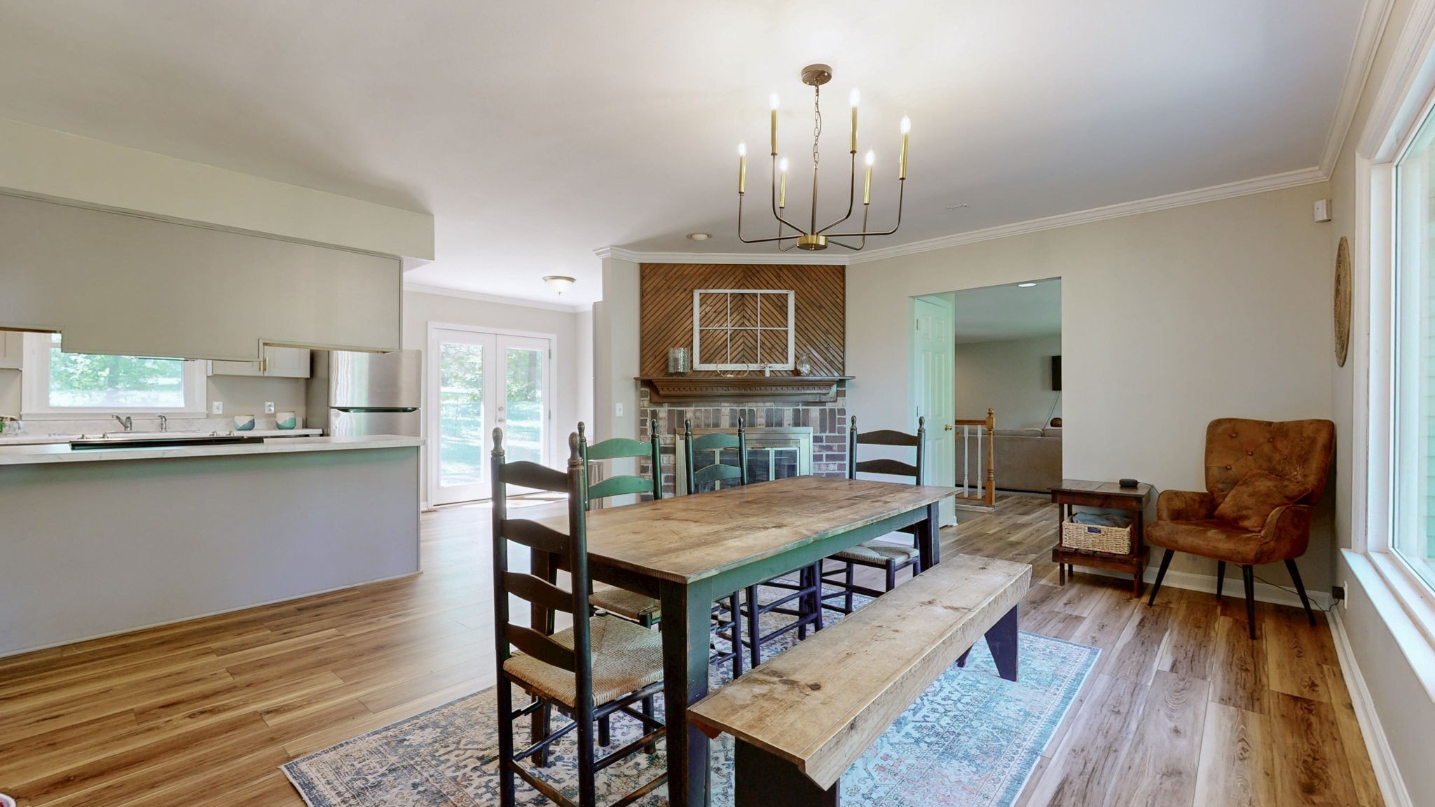 268 Raymond Hodges Road Cottontown, TN 37048 - Photo 7 of 38 a view of a dining room with furniture wooden floor and chandelier