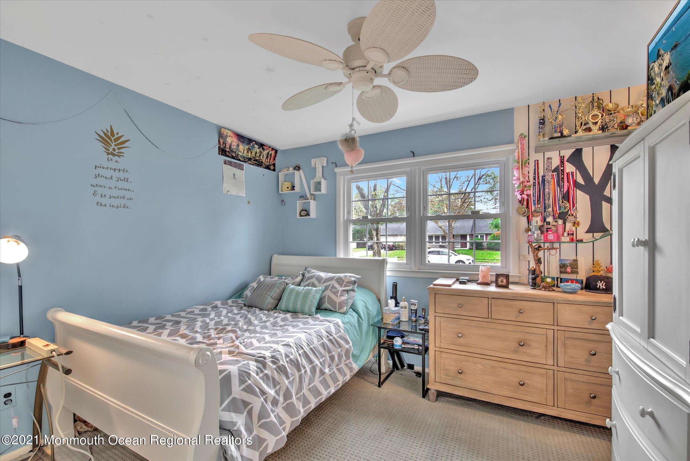 74 Sargent Road Freehold, NJ 07728 - Photo 16 of 23 a bedroom with a bed and a window