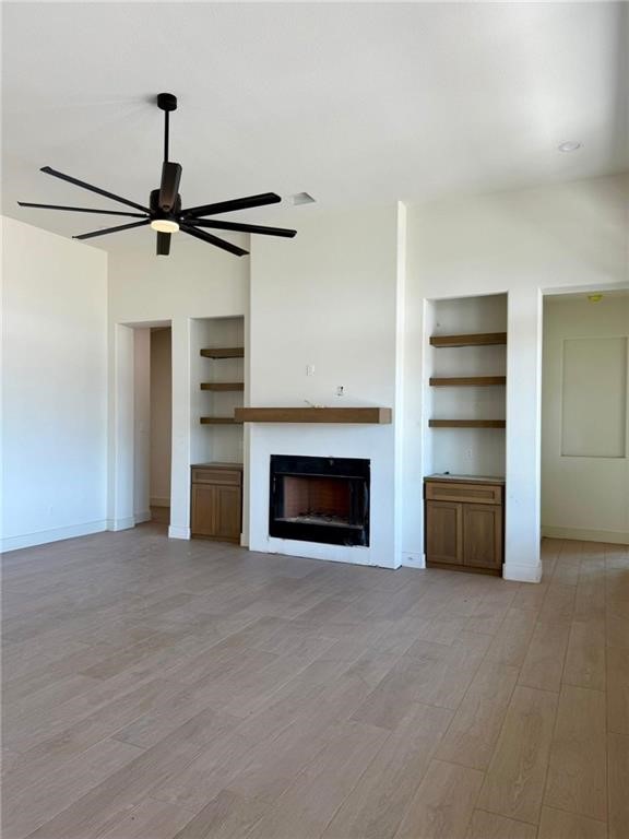 1470 Y O Ranch Drive Corpus Christi, TX 78415 - Photo 8 of 12 a view of an empty room with a fireplace and a window