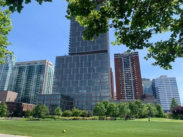 a view of a building with a yard