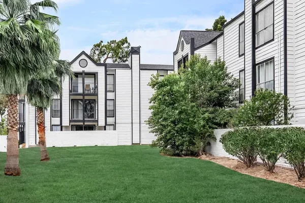 a view of a house with a garden