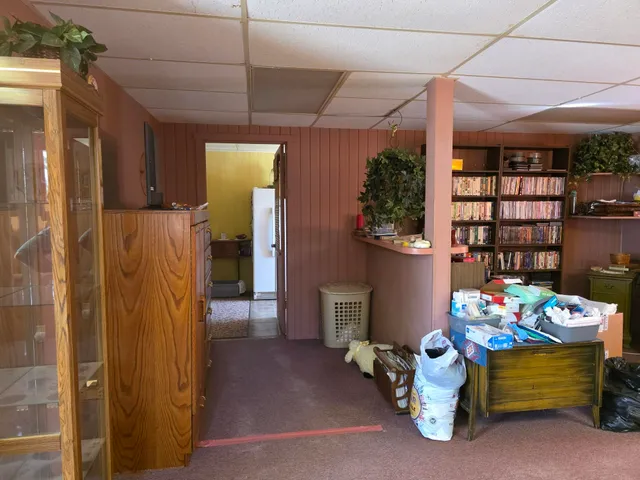 a bedroom with furniture and toys