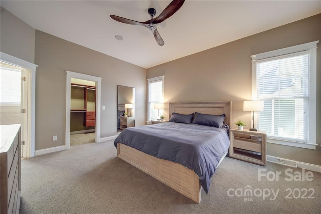 220 Mills Lane Fort Mill, SC 29708 - Photo 17 of 42 a bedroom with a bed and a large window