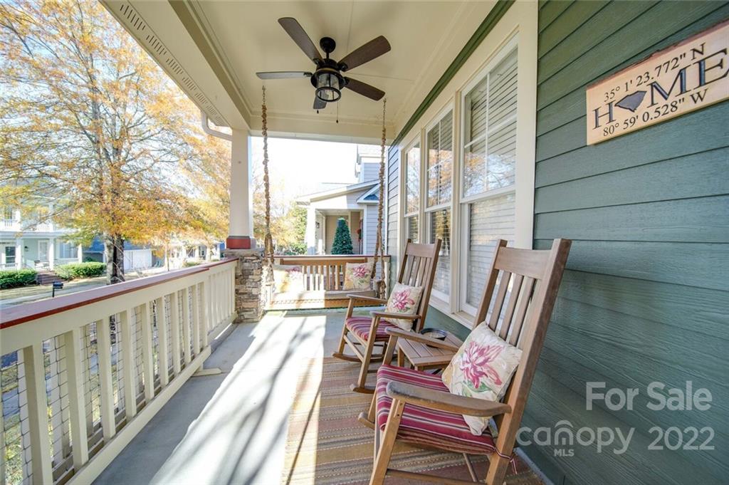 220 Mills Lane Fort Mill, SC 29708 - Photo 2 of 42 a view of a chairs and tables in the balcony