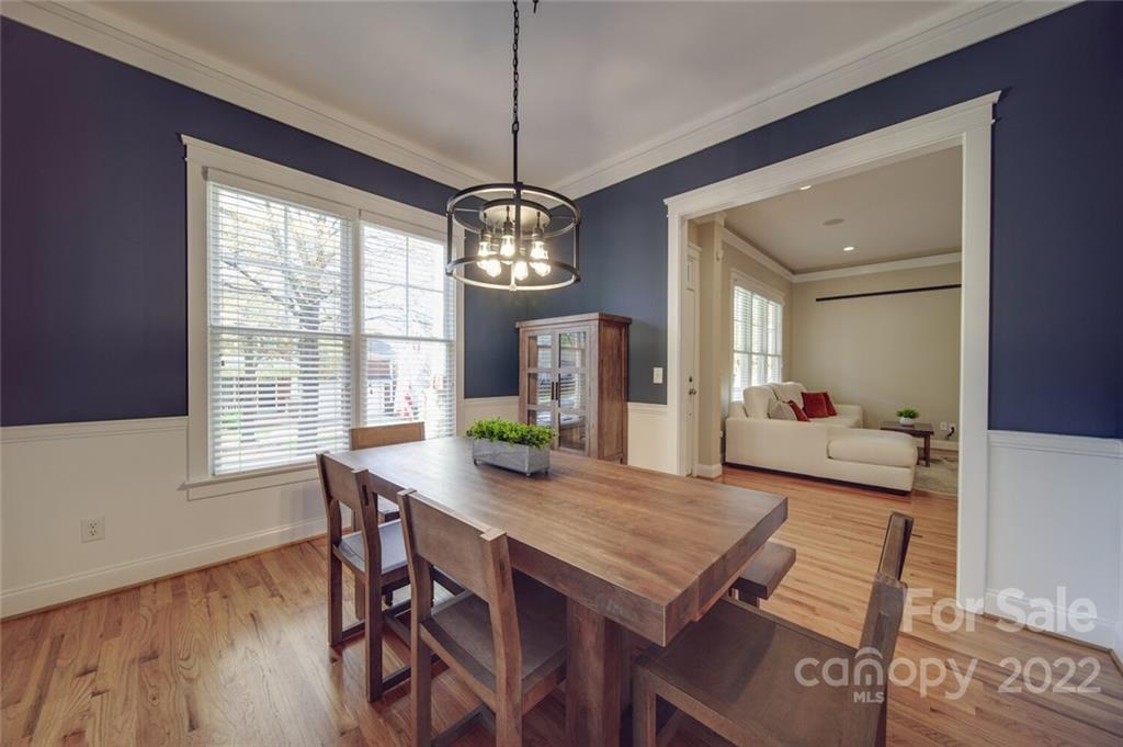220 Mills Lane Fort Mill, SC 29708 - Photo 8 of 42 a view of a dining room with furniture window and wooden floor
