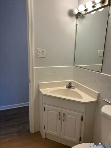 a bathroom with a sink and a vanity