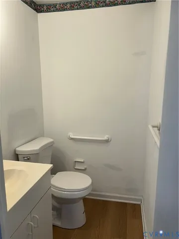 a bathroom with a toilet and a sink