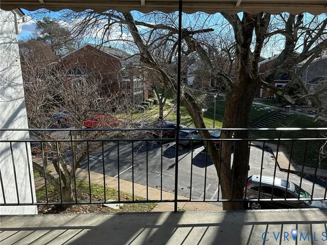 a view of swimming pool with a patio and a yard
