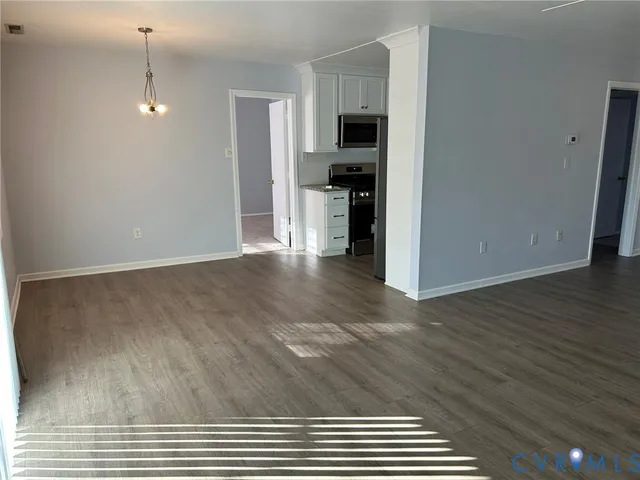 a view of kitchen and living room