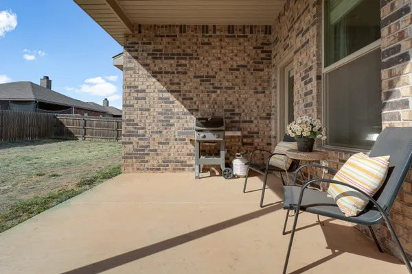a view of swimming pool with outdoor seating and stairs