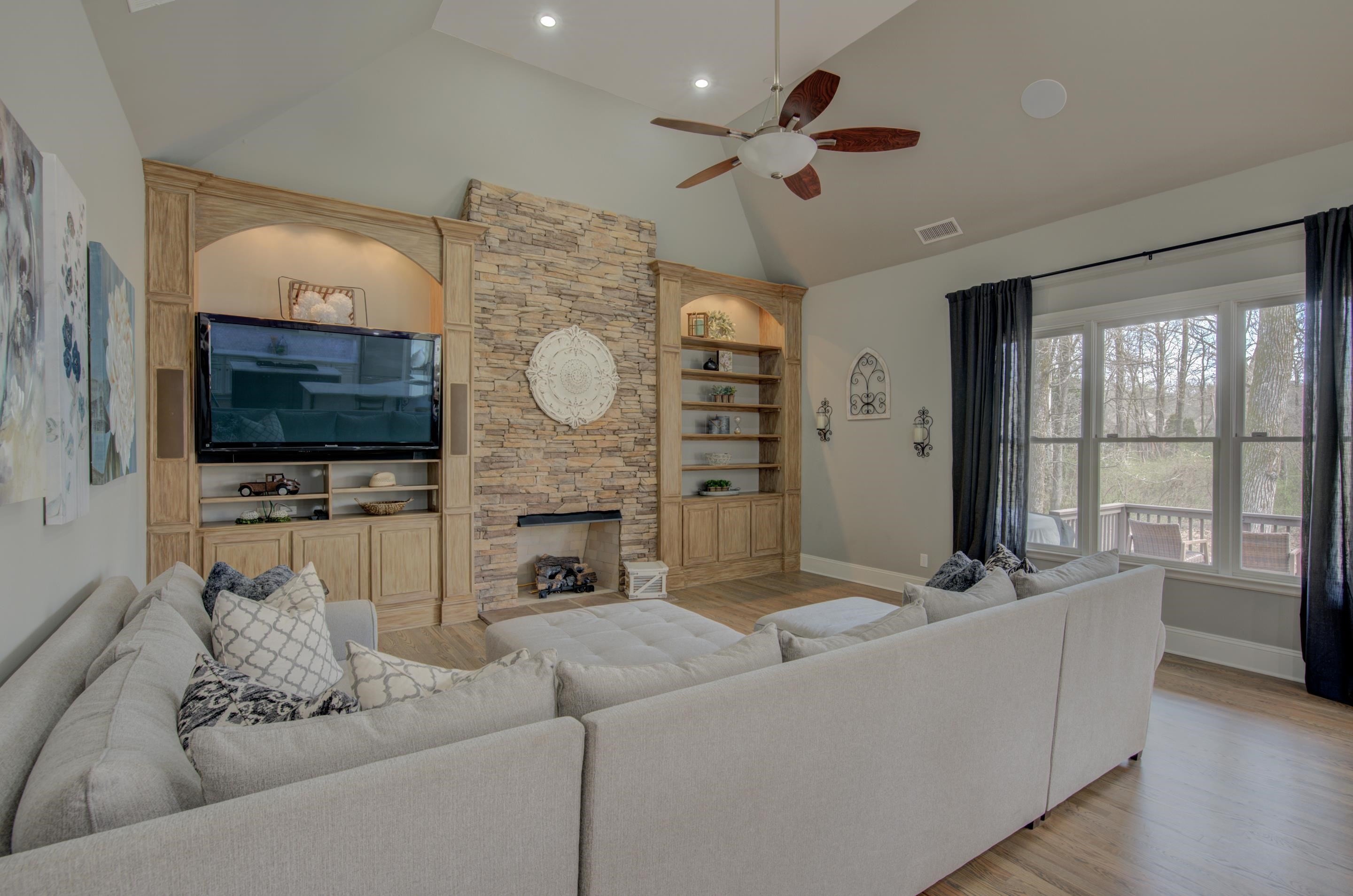 3474 Brooke Edge Lane Collierville, TN 38017 - Photo 11 of 25 a living room with furniture and a flat screen tv