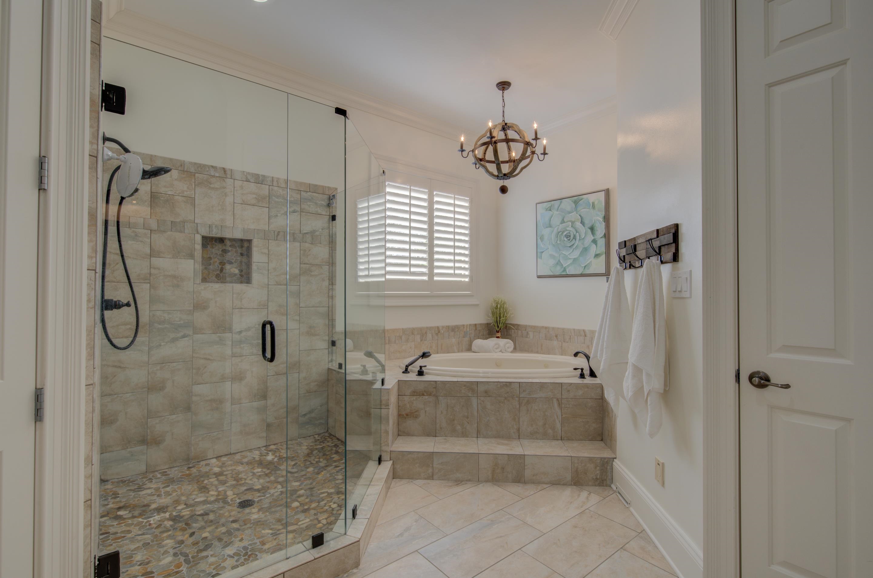 3474 Brooke Edge Lane Collierville, TN 38017 - Photo 13 of 25 a spacious bathroom with a granite countertop sink a toilet and shower