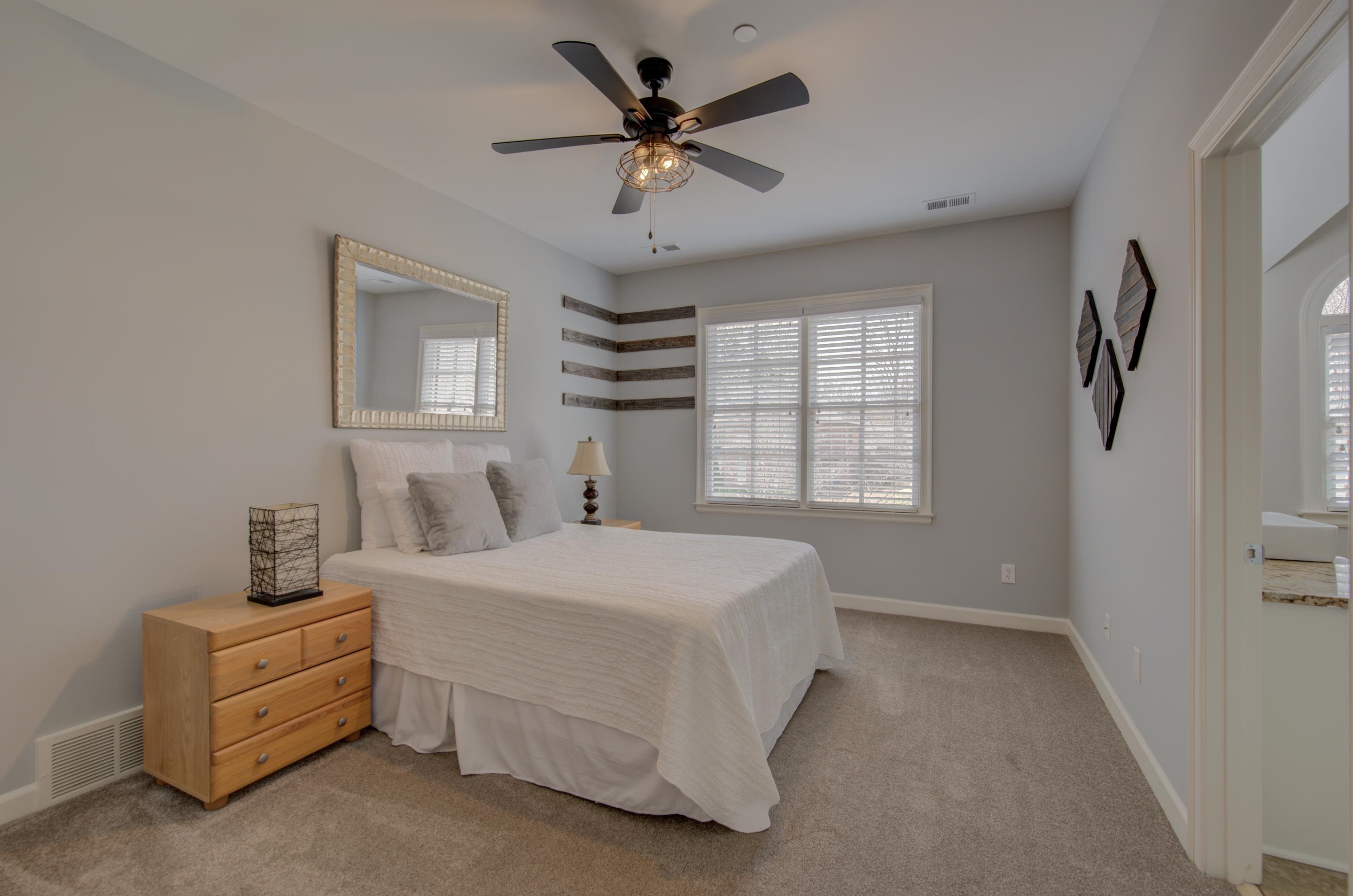 3474 Brooke Edge Lane Collierville, TN 38017 - Photo 20 of 25 a bedroom with a bed dresser and a window