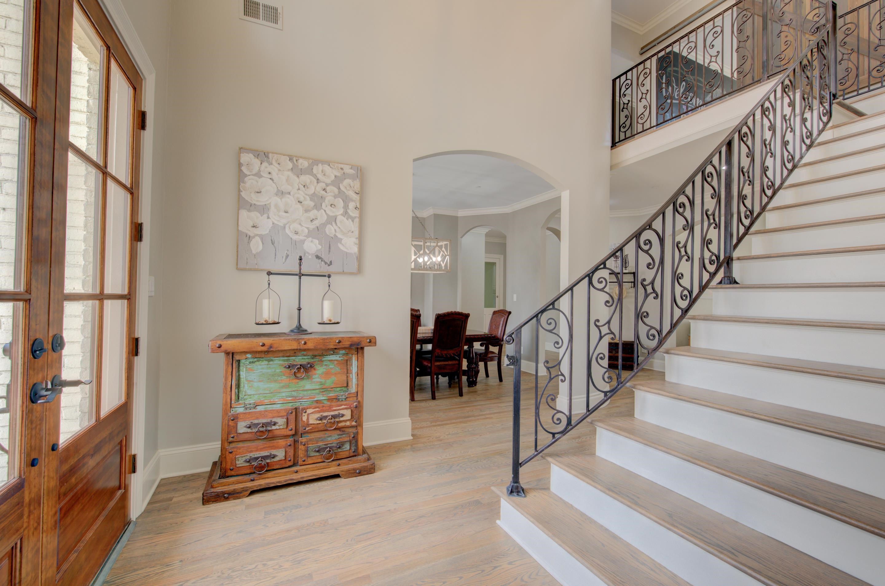 3474 Brooke Edge Lane Collierville, TN 38017 - Photo 2 of 25 a view of staircase with furniture and a chandelier