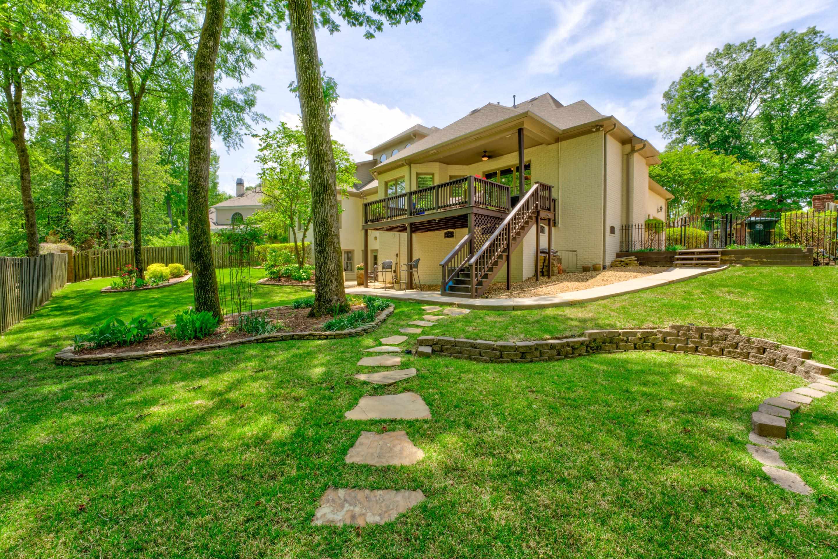 3474 Brooke Edge Lane Collierville, TN 38017 - Photo 23 of 25 a view of a house with big yard and a large tree