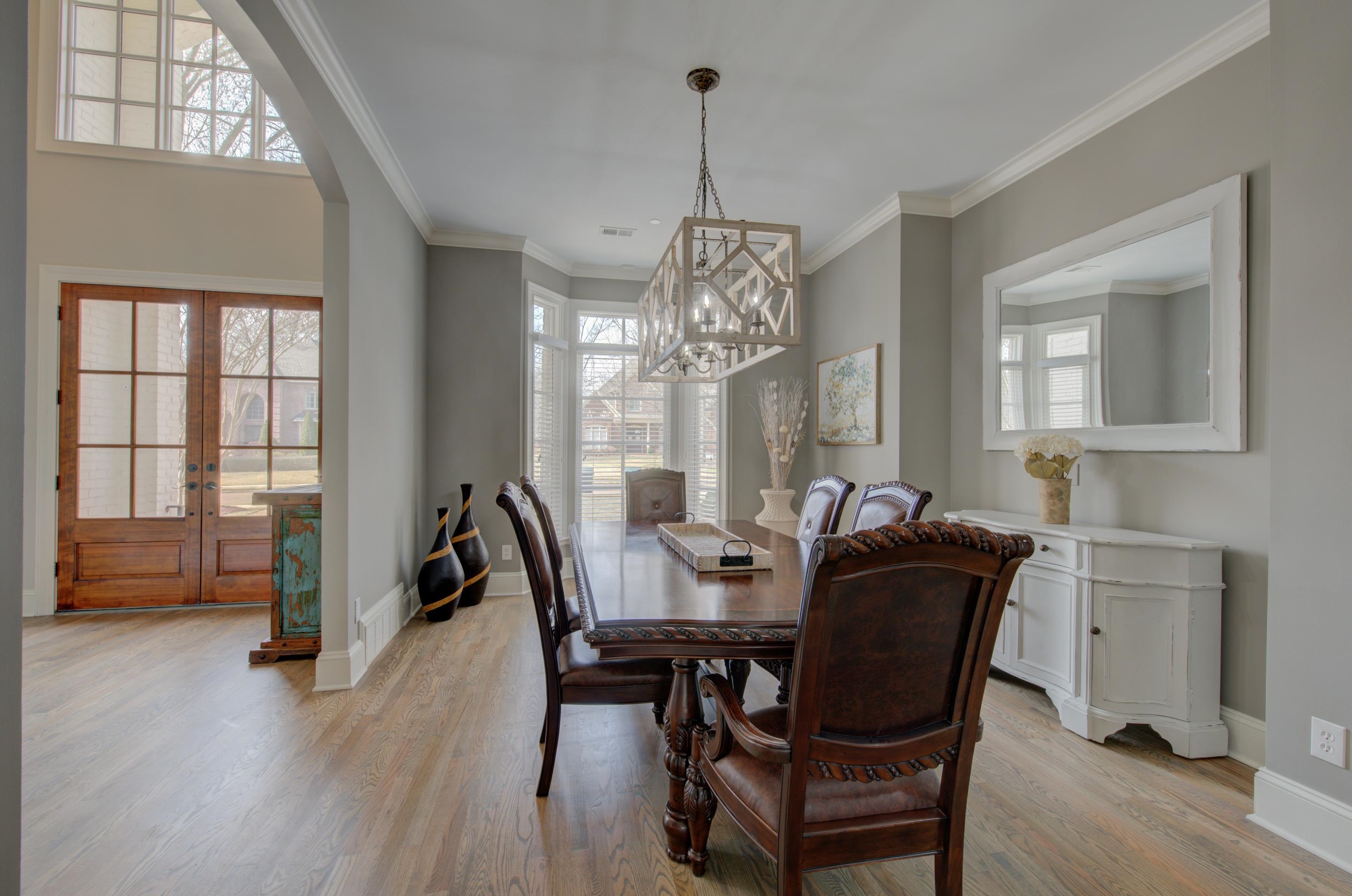 3474 Brooke Edge Lane Collierville, TN 38017 - Photo 6 of 25 a view of a dining room with furniture window and wooden floor