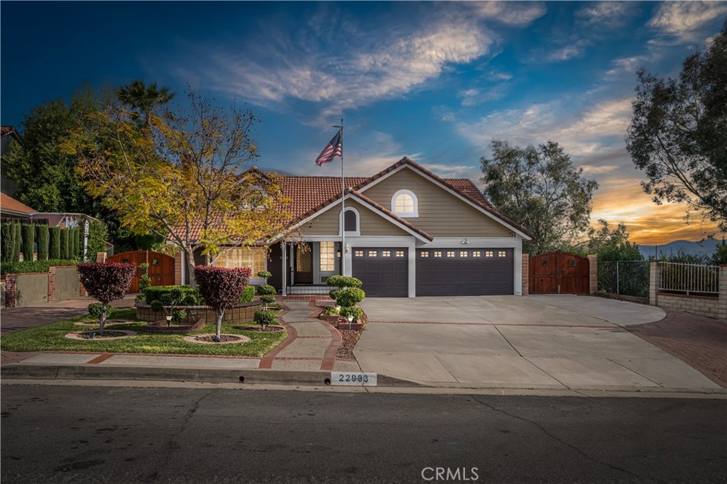 22933 Windtree Avenue Wildomar, CA 92595 - Photo 1 of 1 a front view of a house with a yard