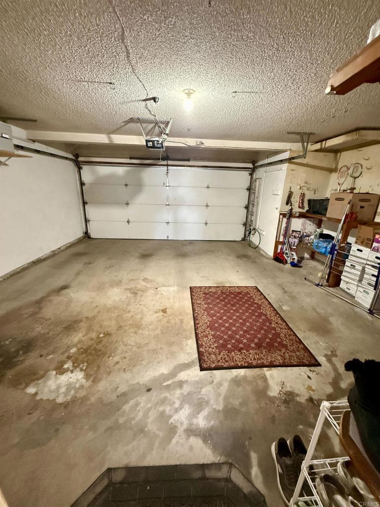 9575 Easter Way, Unit 5 San Diego, CA 92121 - Photo 14 of 19 a view of garage