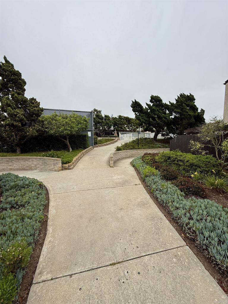 9575 Easter Way, Unit 5 San Diego, CA 92121 - Photo 16 of 19 a view of a garden