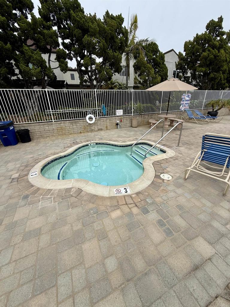 9575 Easter Way, Unit 5 San Diego, CA 92121 - Photo 18 of 19 a view of swimming pool deck patio and outdoor seating
