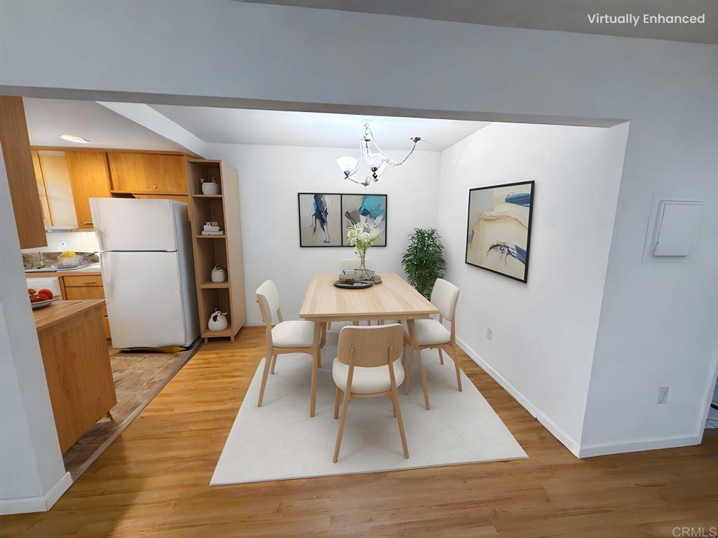 9575 Easter Way, Unit 5 San Diego, CA 92121 - Photo 2 of 19 a living room with a couch and a table
