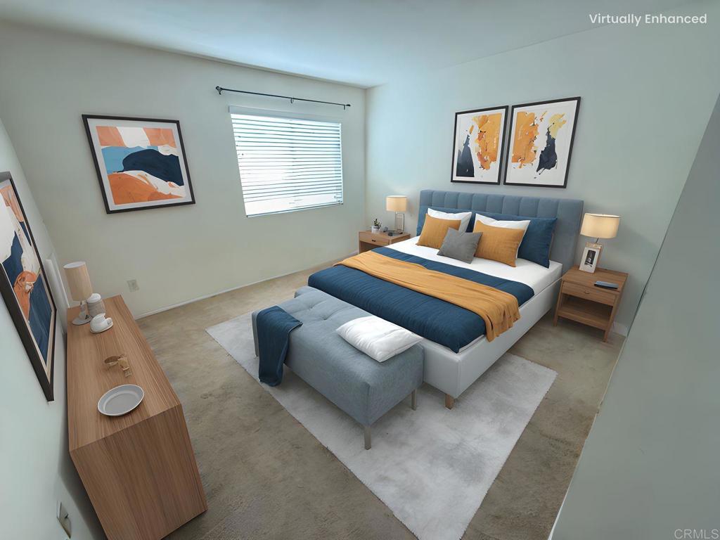 9575 Easter Way, Unit 5 San Diego, CA 92121 - Photo 5 of 19 a bedroom with bed and a couch