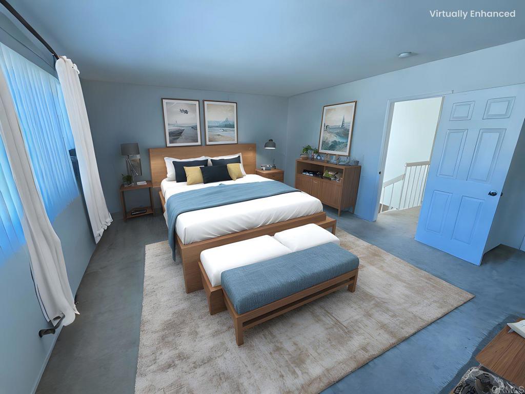 9575 Easter Way, Unit 5 San Diego, CA 92121 - Photo 6 of 19 a bedroom with a bed and a mirror