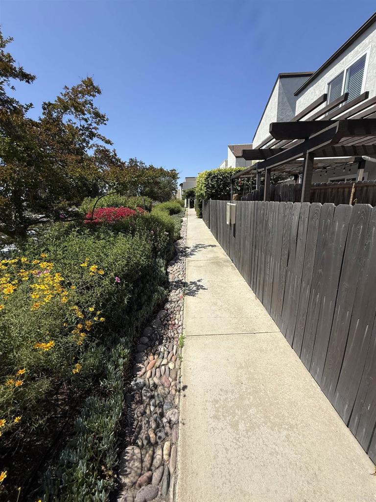 9575 Easter Way, Unit 5 San Diego, CA 92121 - Photo 9 of 19 a view of house with outdoor space