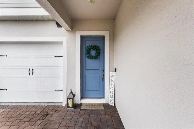 a view of a hallway with wooden shelves