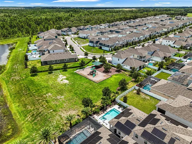 an aerial view of a house with a garden