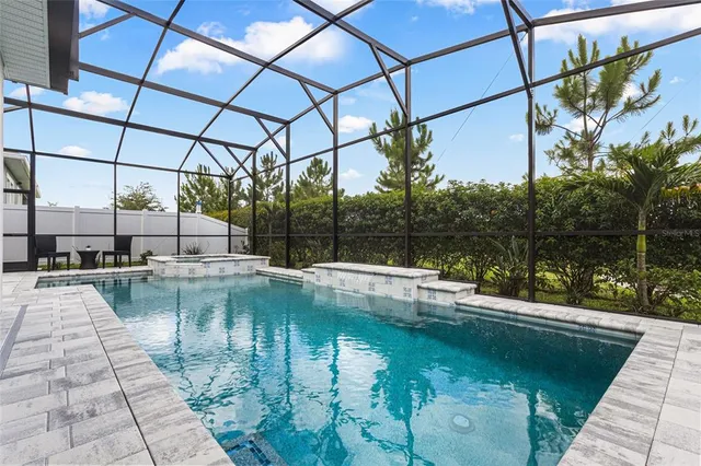 a view of a swimming pool with a lake view