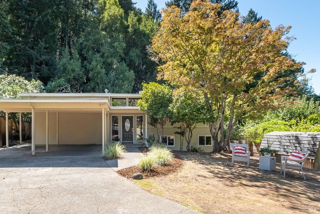a view of a house with a patio